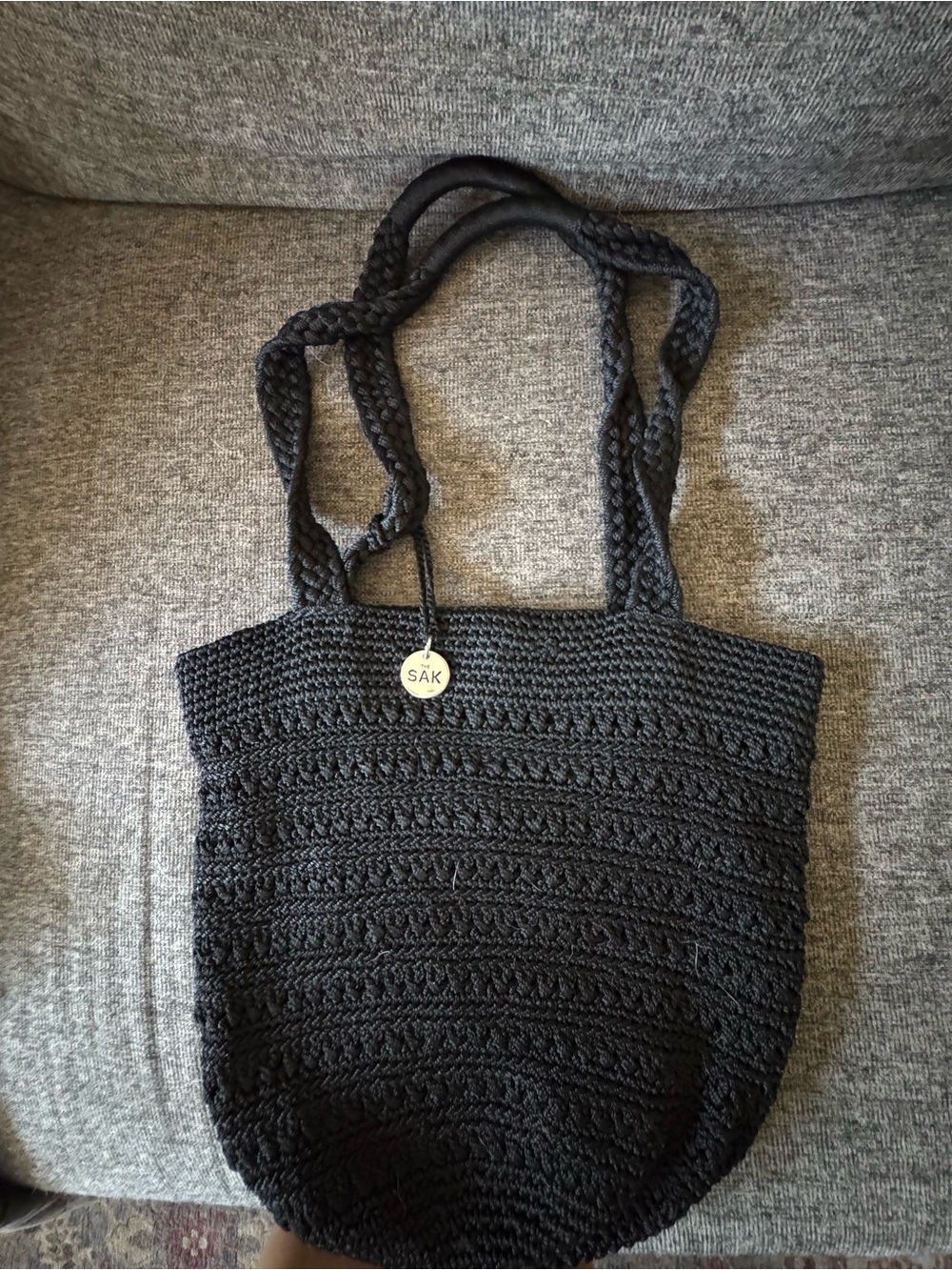 The Sak Black Crochet Tote with Braided Shoulder Straps